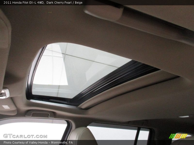 Dark Cherry Pearl / Beige 2011 Honda Pilot EX-L 4WD