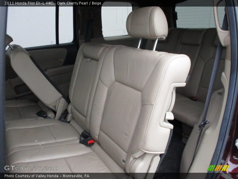 Dark Cherry Pearl / Beige 2011 Honda Pilot EX-L 4WD