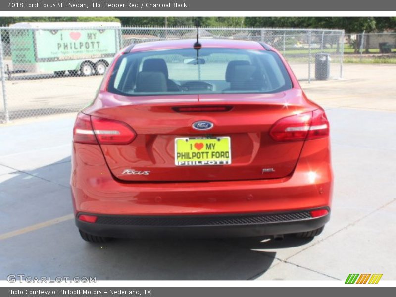 Hot Pepper Red / Charcoal Black 2018 Ford Focus SEL Sedan