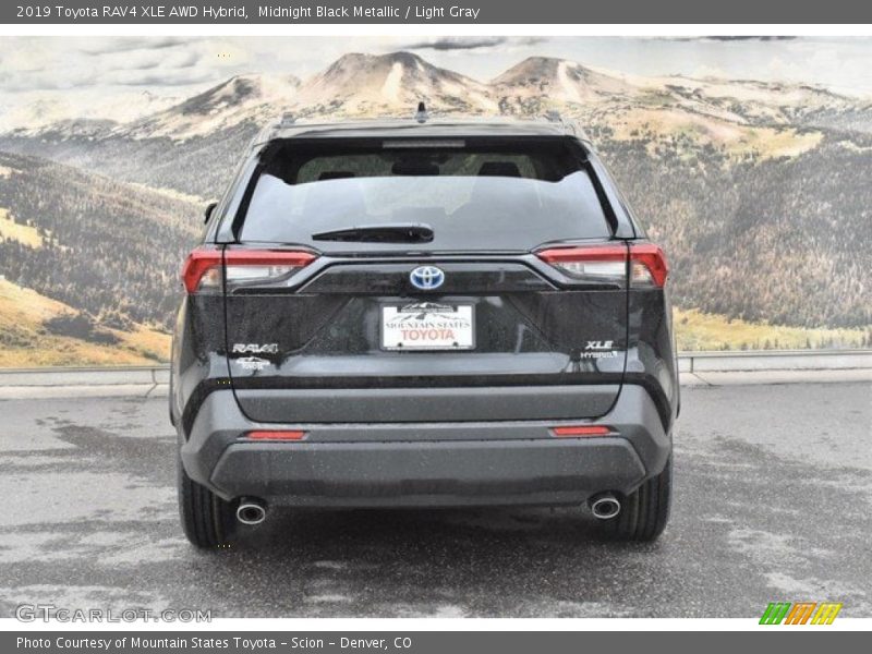 Midnight Black Metallic / Light Gray 2019 Toyota RAV4 XLE AWD Hybrid