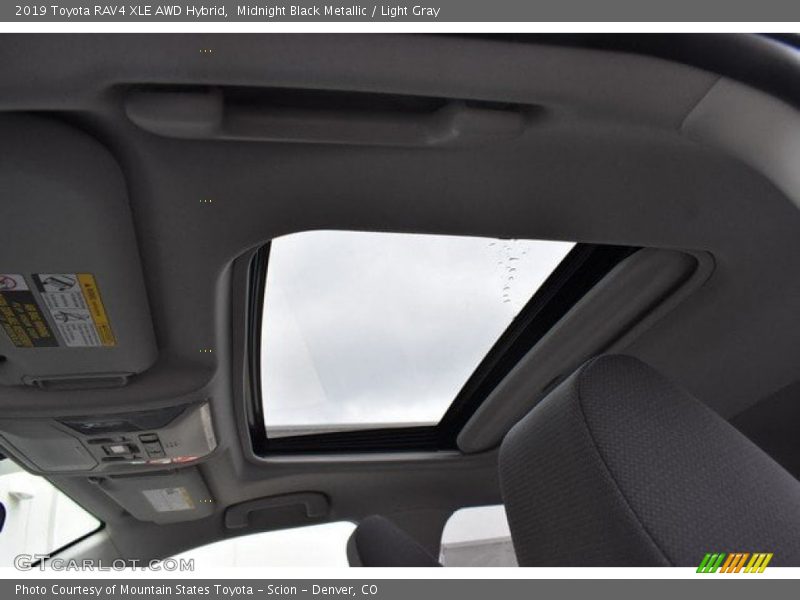 Midnight Black Metallic / Light Gray 2019 Toyota RAV4 XLE AWD Hybrid