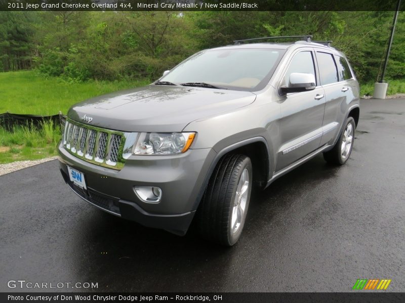 Mineral Gray Metallic / New Saddle/Black 2011 Jeep Grand Cherokee Overland 4x4