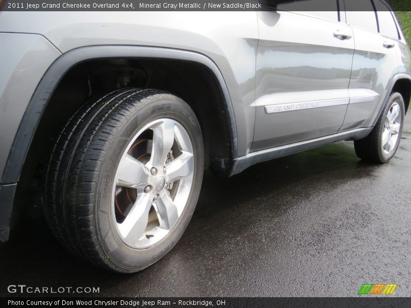 Mineral Gray Metallic / New Saddle/Black 2011 Jeep Grand Cherokee Overland 4x4