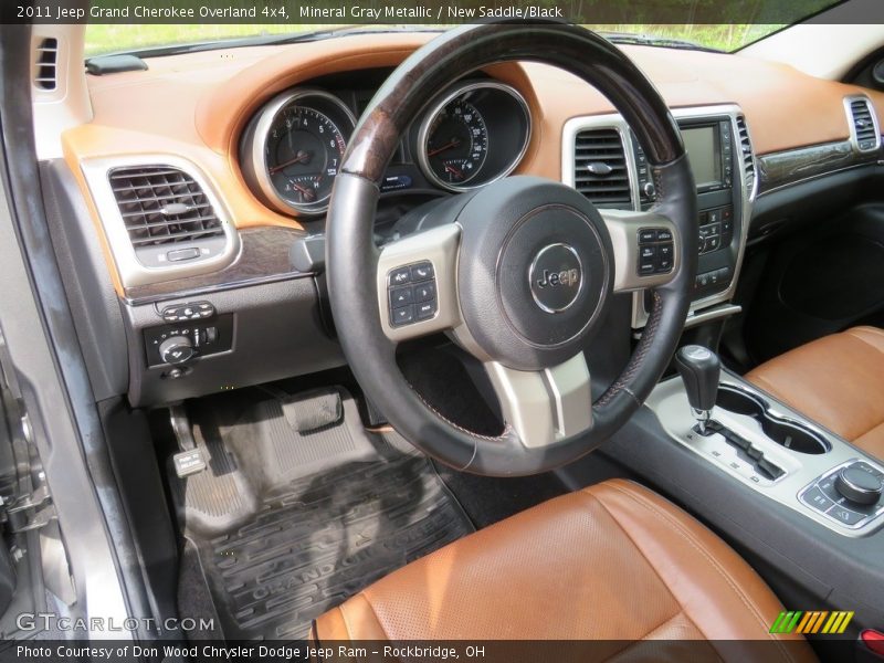 Mineral Gray Metallic / New Saddle/Black 2011 Jeep Grand Cherokee Overland 4x4