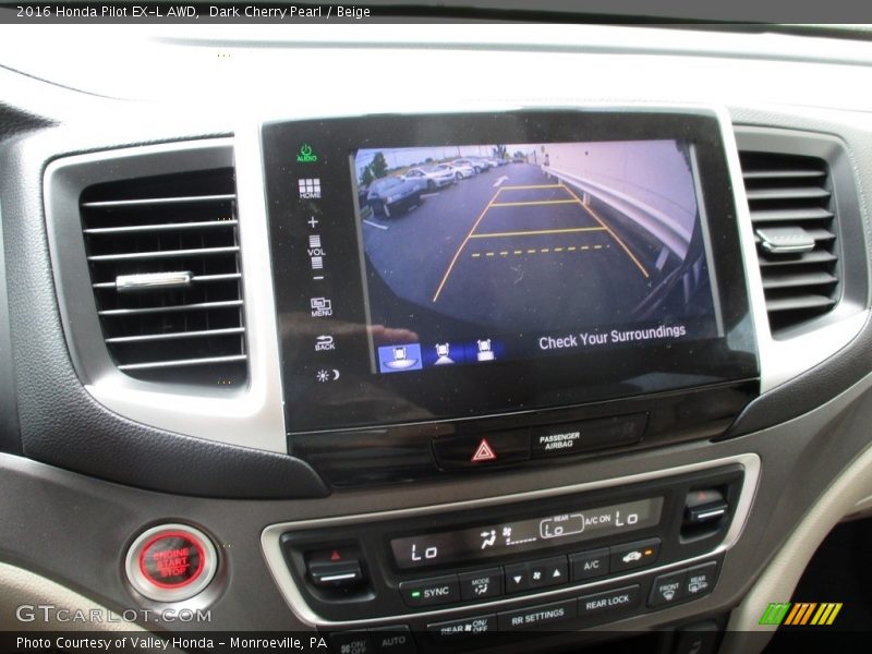 Dark Cherry Pearl / Beige 2016 Honda Pilot EX-L AWD