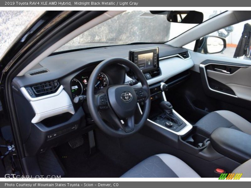 Midnight Black Metallic / Light Gray 2019 Toyota RAV4 XLE AWD Hybrid