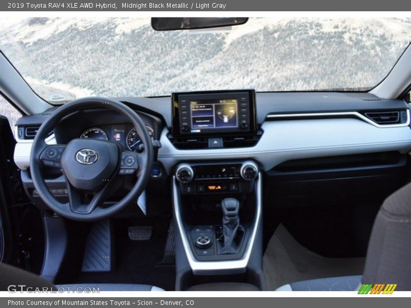 Midnight Black Metallic / Light Gray 2019 Toyota RAV4 XLE AWD Hybrid