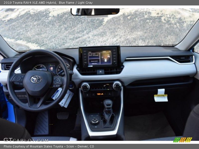 Blue Flame / Light Gray 2019 Toyota RAV4 XLE AWD Hybrid
