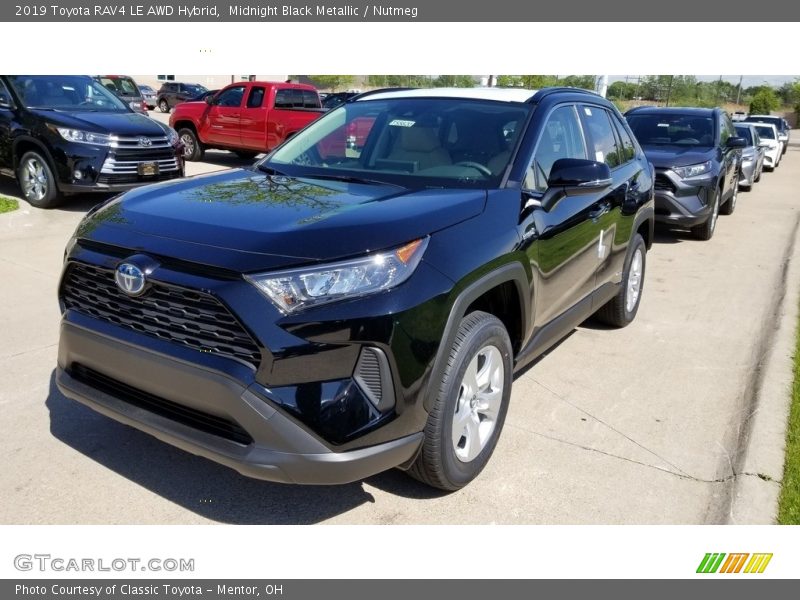 Midnight Black Metallic / Nutmeg 2019 Toyota RAV4 LE AWD Hybrid