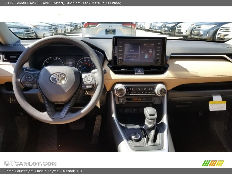 Midnight Black Metallic / Nutmeg 2019 Toyota RAV4 LE AWD Hybrid