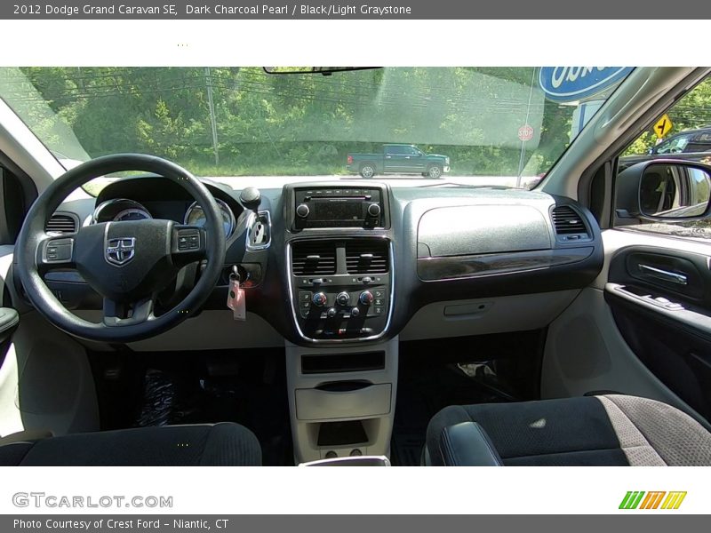 Dark Charcoal Pearl / Black/Light Graystone 2012 Dodge Grand Caravan SE