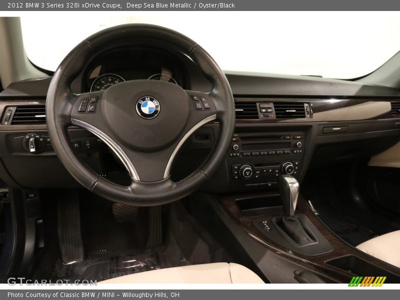 Deep Sea Blue Metallic / Oyster/Black 2012 BMW 3 Series 328i xDrive Coupe