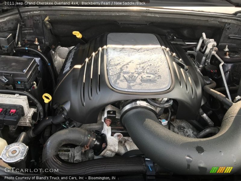 Blackberry Pearl / New Saddle/Black 2011 Jeep Grand Cherokee Overland 4x4