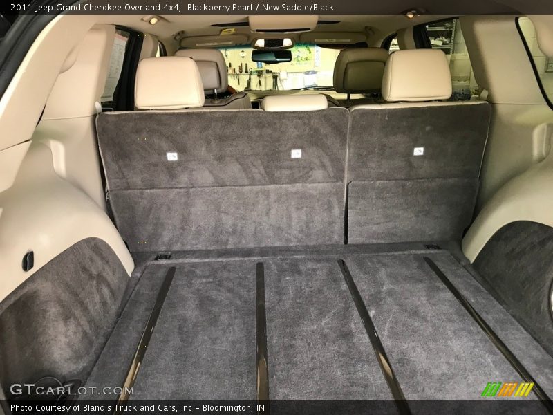 Blackberry Pearl / New Saddle/Black 2011 Jeep Grand Cherokee Overland 4x4