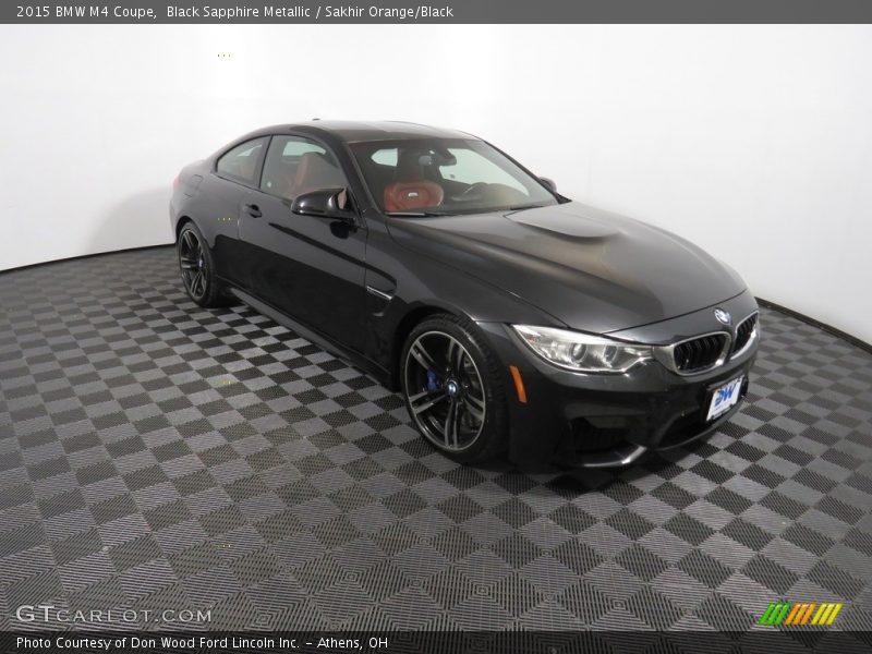 Black Sapphire Metallic / Sakhir Orange/Black 2015 BMW M4 Coupe