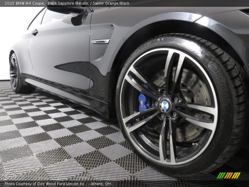Black Sapphire Metallic / Sakhir Orange/Black 2015 BMW M4 Coupe
