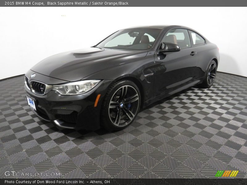 Black Sapphire Metallic / Sakhir Orange/Black 2015 BMW M4 Coupe