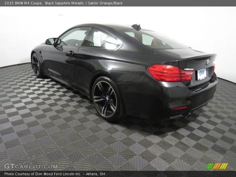 Black Sapphire Metallic / Sakhir Orange/Black 2015 BMW M4 Coupe