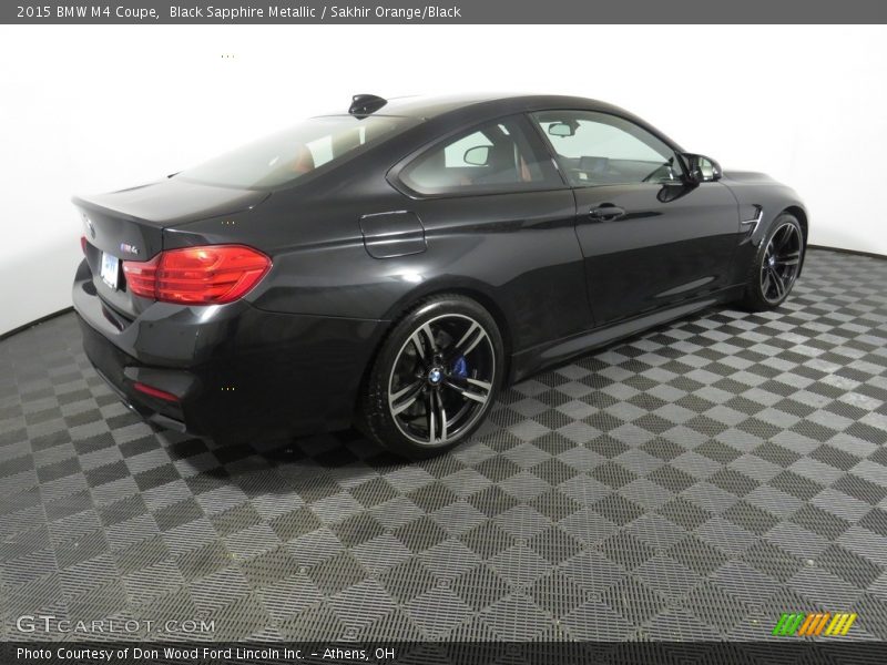Black Sapphire Metallic / Sakhir Orange/Black 2015 BMW M4 Coupe
