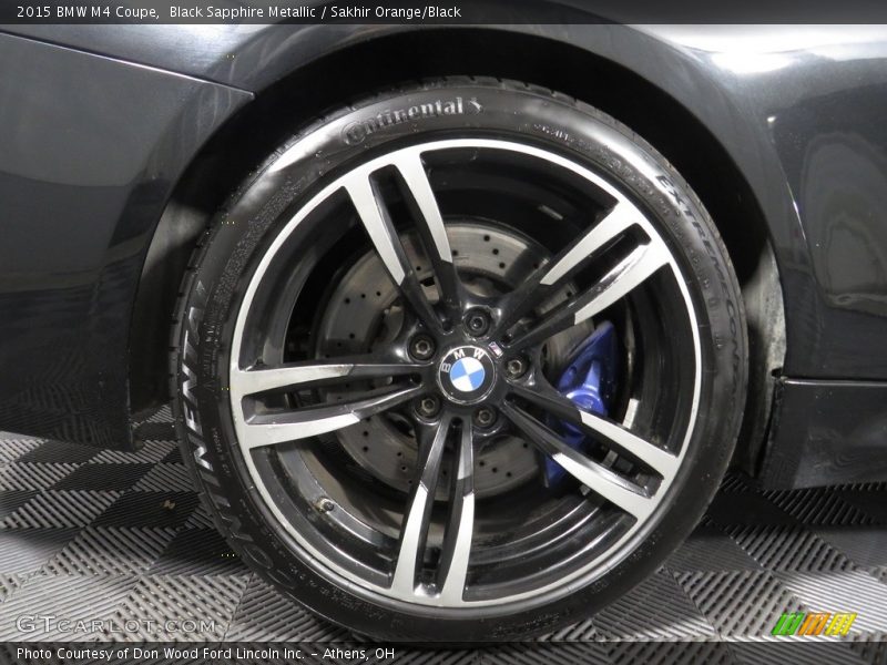 Black Sapphire Metallic / Sakhir Orange/Black 2015 BMW M4 Coupe