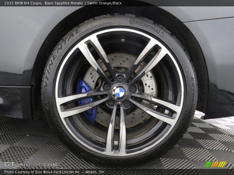Black Sapphire Metallic / Sakhir Orange/Black 2015 BMW M4 Coupe
