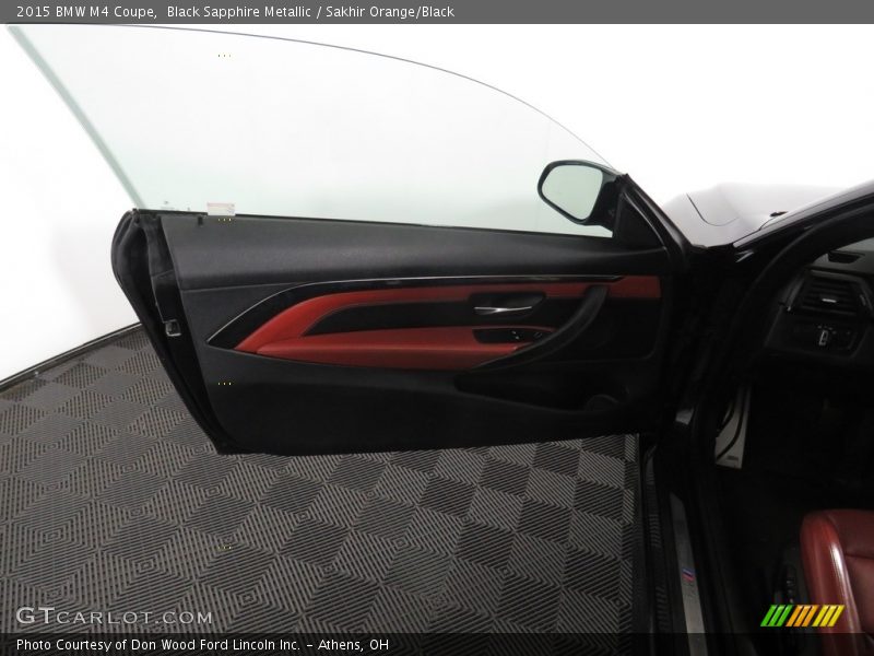 Black Sapphire Metallic / Sakhir Orange/Black 2015 BMW M4 Coupe