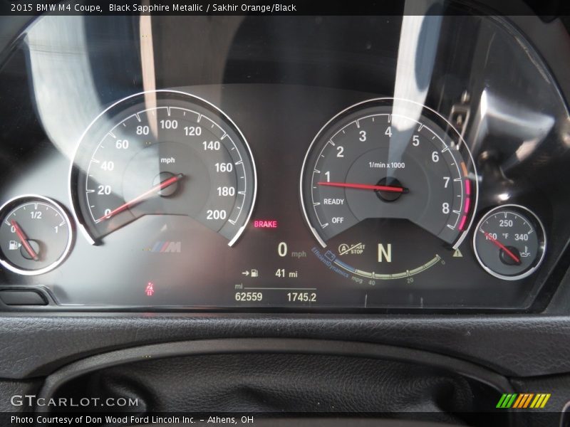 Black Sapphire Metallic / Sakhir Orange/Black 2015 BMW M4 Coupe