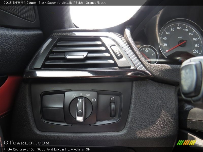 Black Sapphire Metallic / Sakhir Orange/Black 2015 BMW M4 Coupe