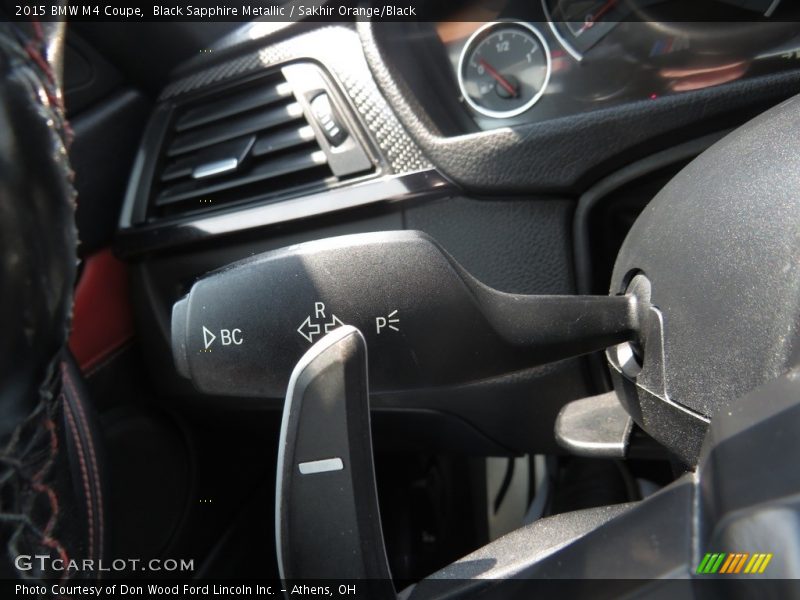 Black Sapphire Metallic / Sakhir Orange/Black 2015 BMW M4 Coupe