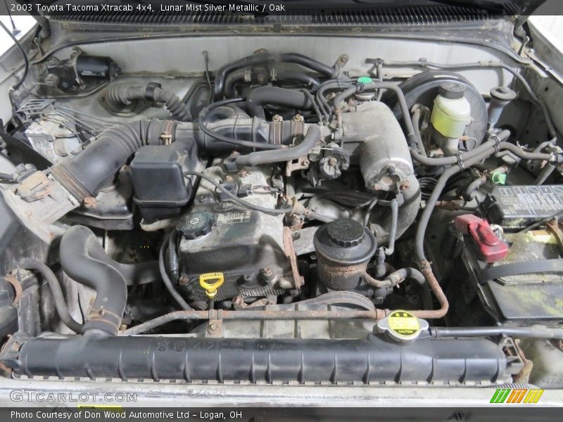 Lunar Mist Silver Metallic / Oak 2003 Toyota Tacoma Xtracab 4x4