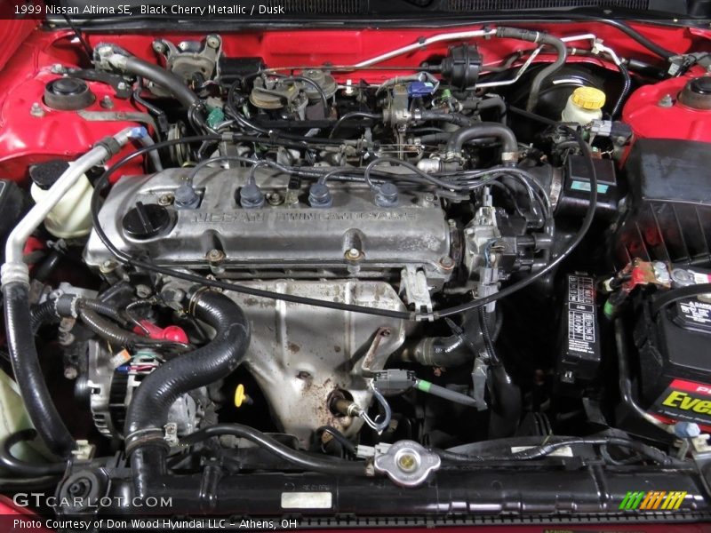 Black Cherry Metallic / Dusk 1999 Nissan Altima SE