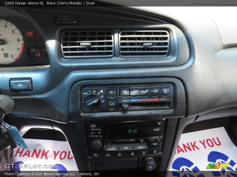 Black Cherry Metallic / Dusk 1999 Nissan Altima SE