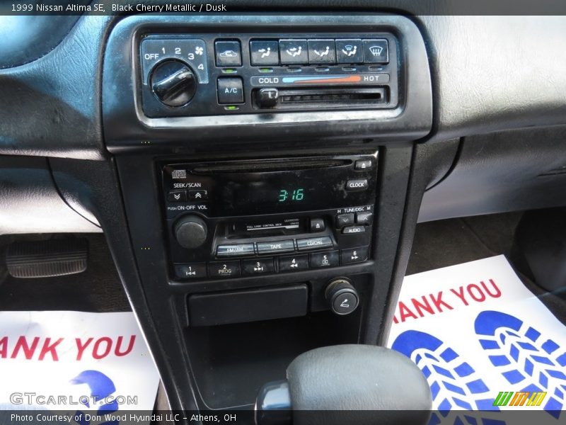 Black Cherry Metallic / Dusk 1999 Nissan Altima SE