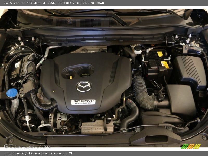 Jet Black Mica / Caturra Brown 2019 Mazda CX-5 Signature AWD
