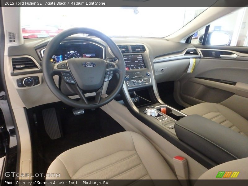  2019 Fusion SE Medium Light Stone Interior