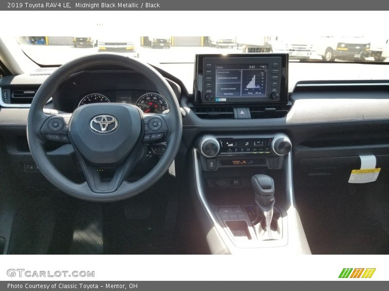 Midnight Black Metallic / Black 2019 Toyota RAV4 LE