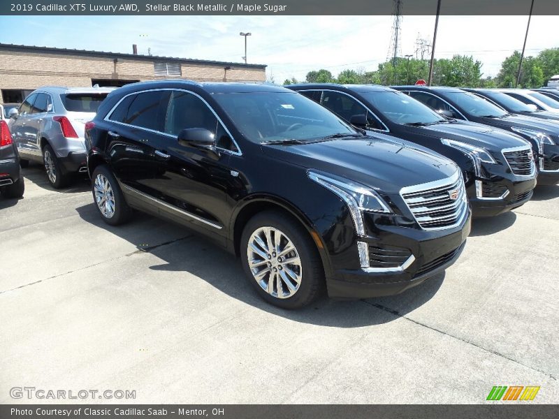 Stellar Black Metallic / Maple Sugar 2019 Cadillac XT5 Luxury AWD