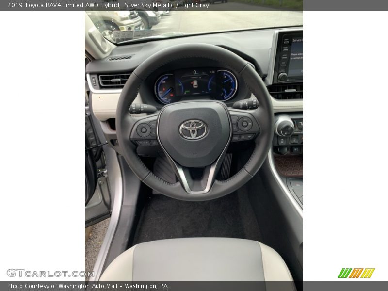 Silver Sky Metallic / Light Gray 2019 Toyota RAV4 Limited AWD Hybrid