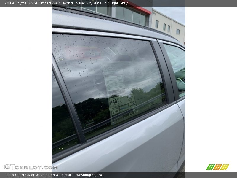 Silver Sky Metallic / Light Gray 2019 Toyota RAV4 Limited AWD Hybrid