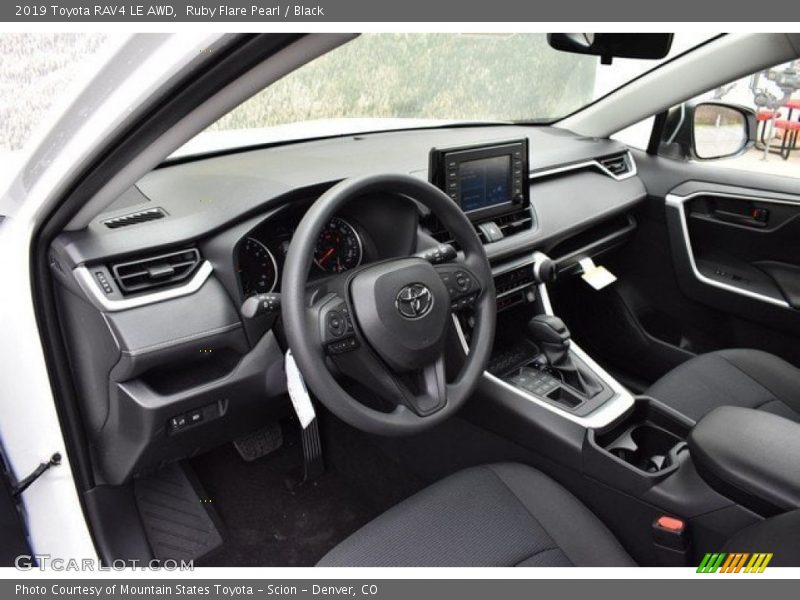 Ruby Flare Pearl / Black 2019 Toyota RAV4 LE AWD
