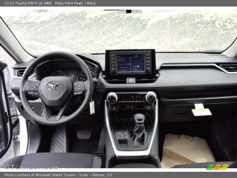 Ruby Flare Pearl / Black 2019 Toyota RAV4 LE AWD