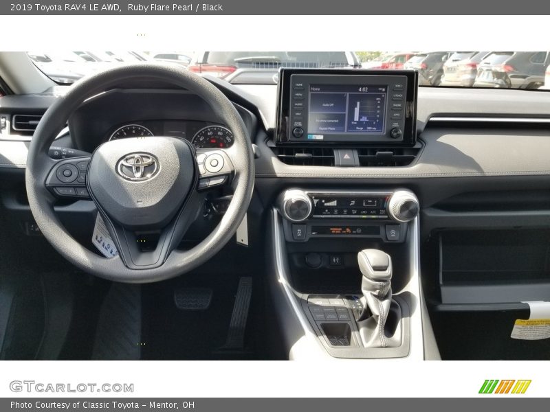 Ruby Flare Pearl / Black 2019 Toyota RAV4 LE AWD