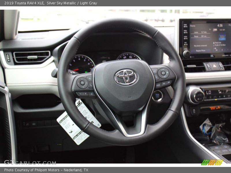 Silver Sky Metallic / Light Gray 2019 Toyota RAV4 XLE