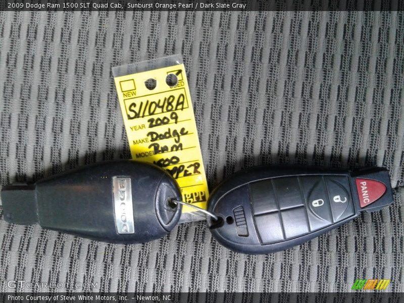 Sunburst Orange Pearl / Dark Slate Gray 2009 Dodge Ram 1500 SLT Quad Cab