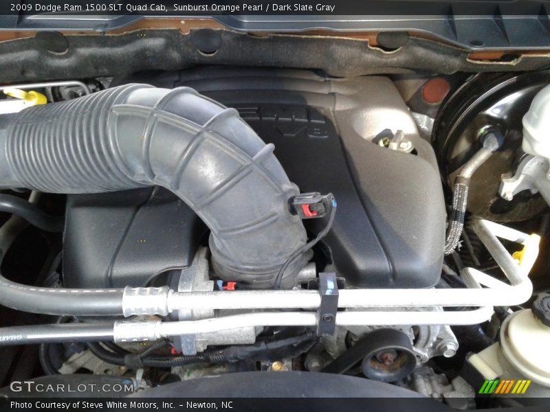 Sunburst Orange Pearl / Dark Slate Gray 2009 Dodge Ram 1500 SLT Quad Cab