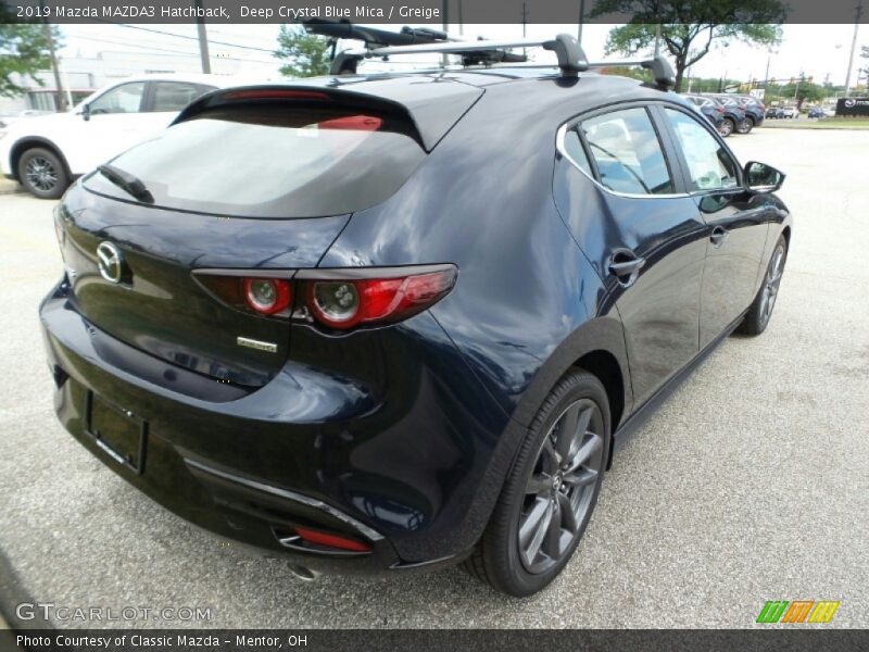 Deep Crystal Blue Mica / Greige 2019 Mazda MAZDA3 Hatchback