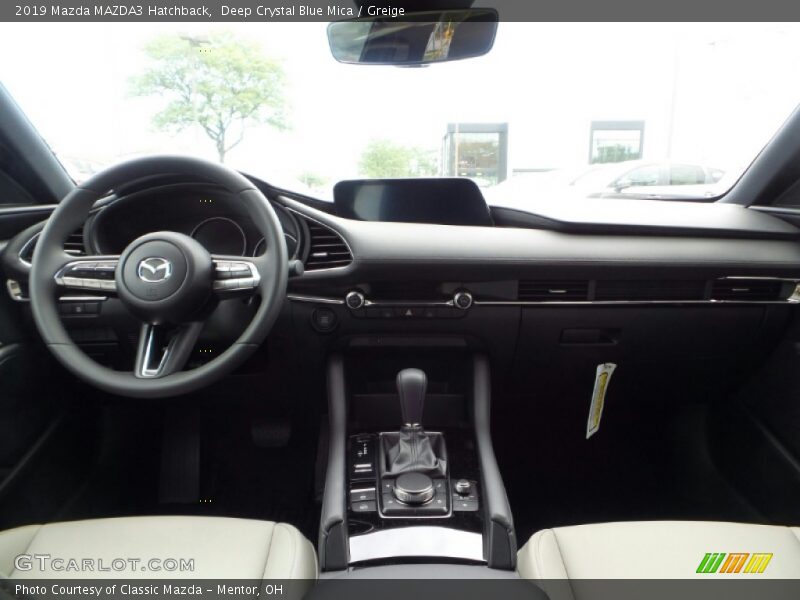 Deep Crystal Blue Mica / Greige 2019 Mazda MAZDA3 Hatchback