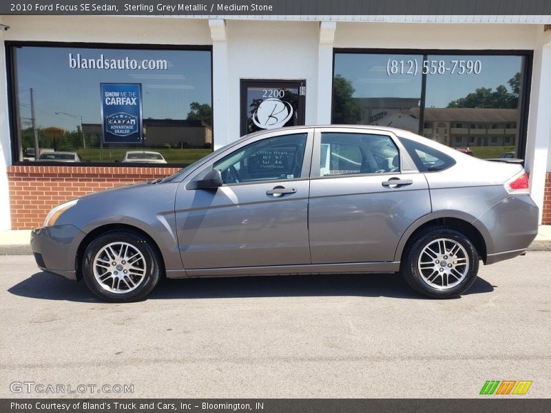 Sterling Grey Metallic / Medium Stone 2010 Ford Focus SE Sedan