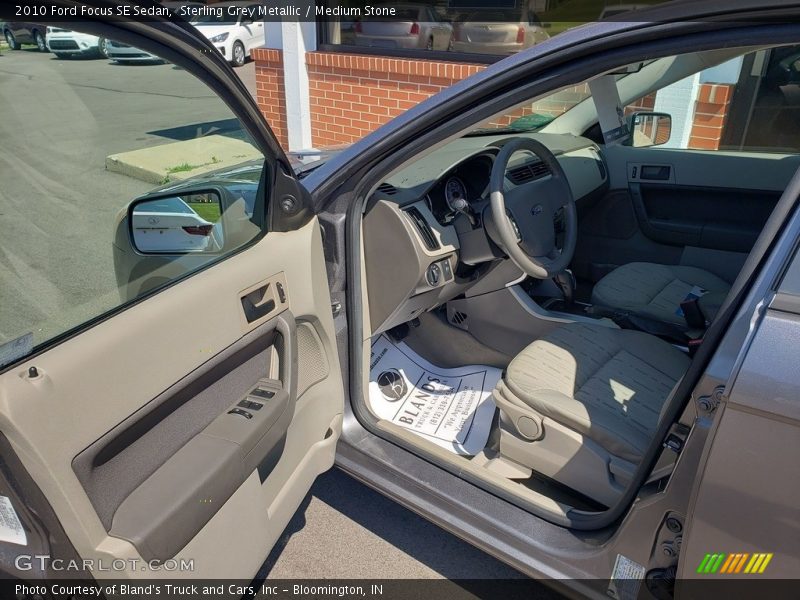 Sterling Grey Metallic / Medium Stone 2010 Ford Focus SE Sedan