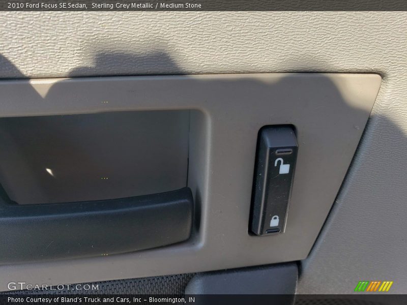 Sterling Grey Metallic / Medium Stone 2010 Ford Focus SE Sedan